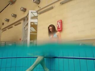 Alluring brunette Deniska underwater